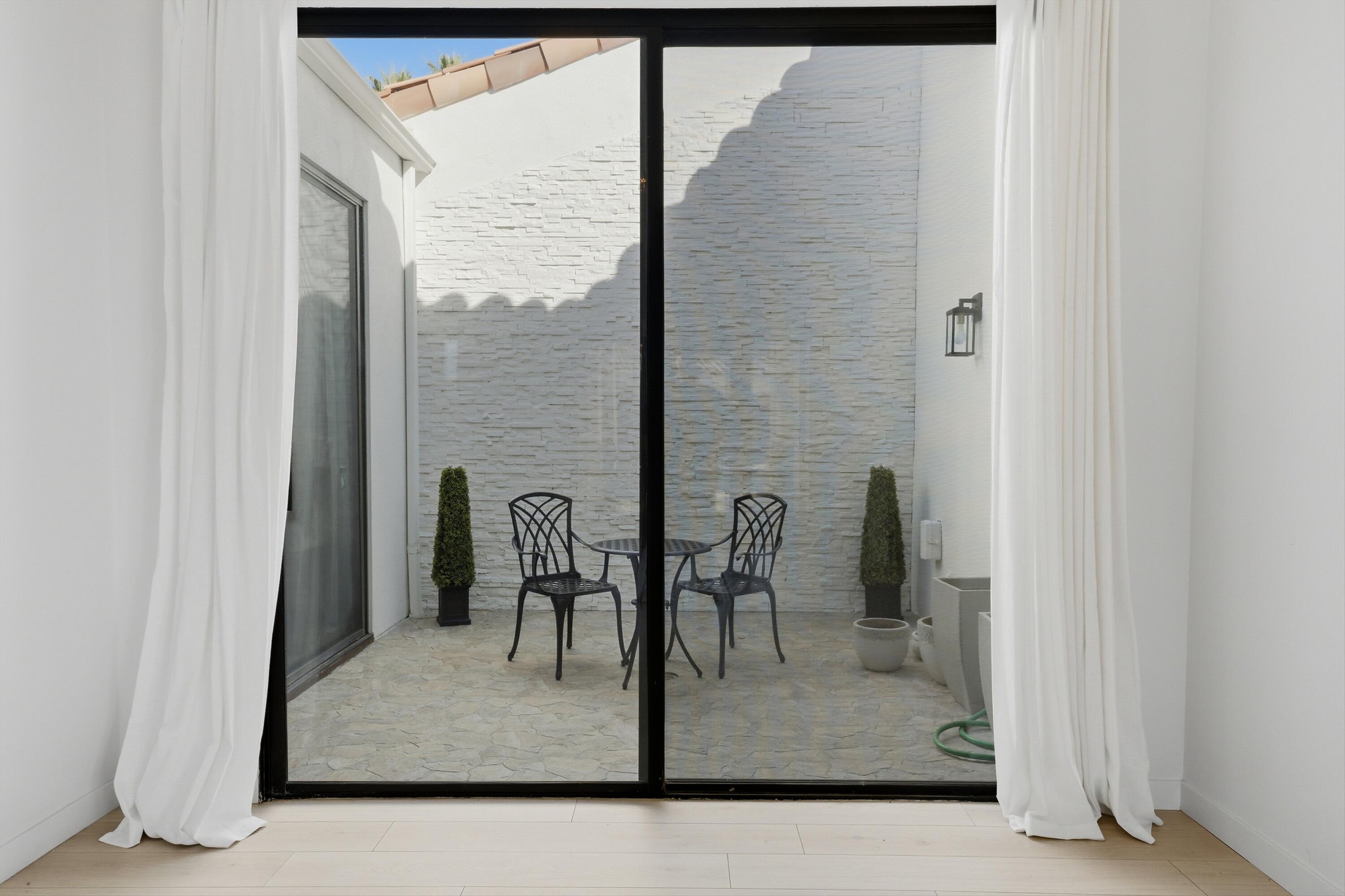 56300 Pebble Beach La Quinta, CA 92253 - Photo 16 of 45 a view of a room with a table and chairs