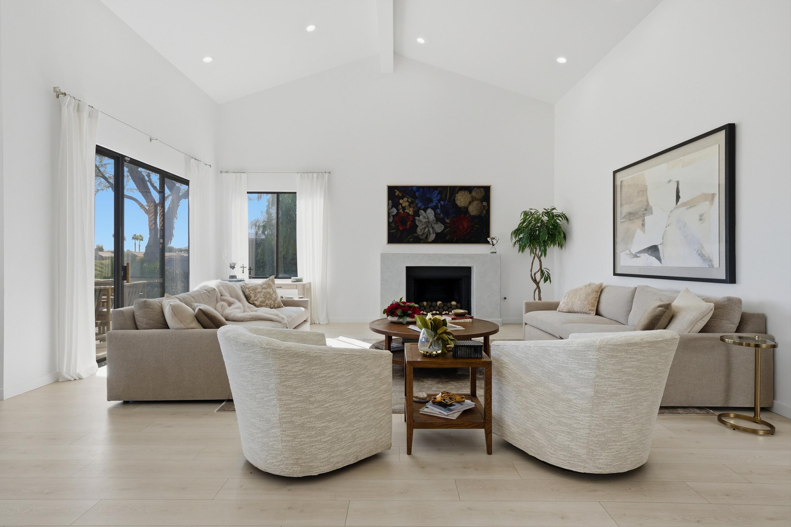 56300 Pebble Beach La Quinta, CA 92253 - Photo 19 of 45 a living room with furniture and a fireplace