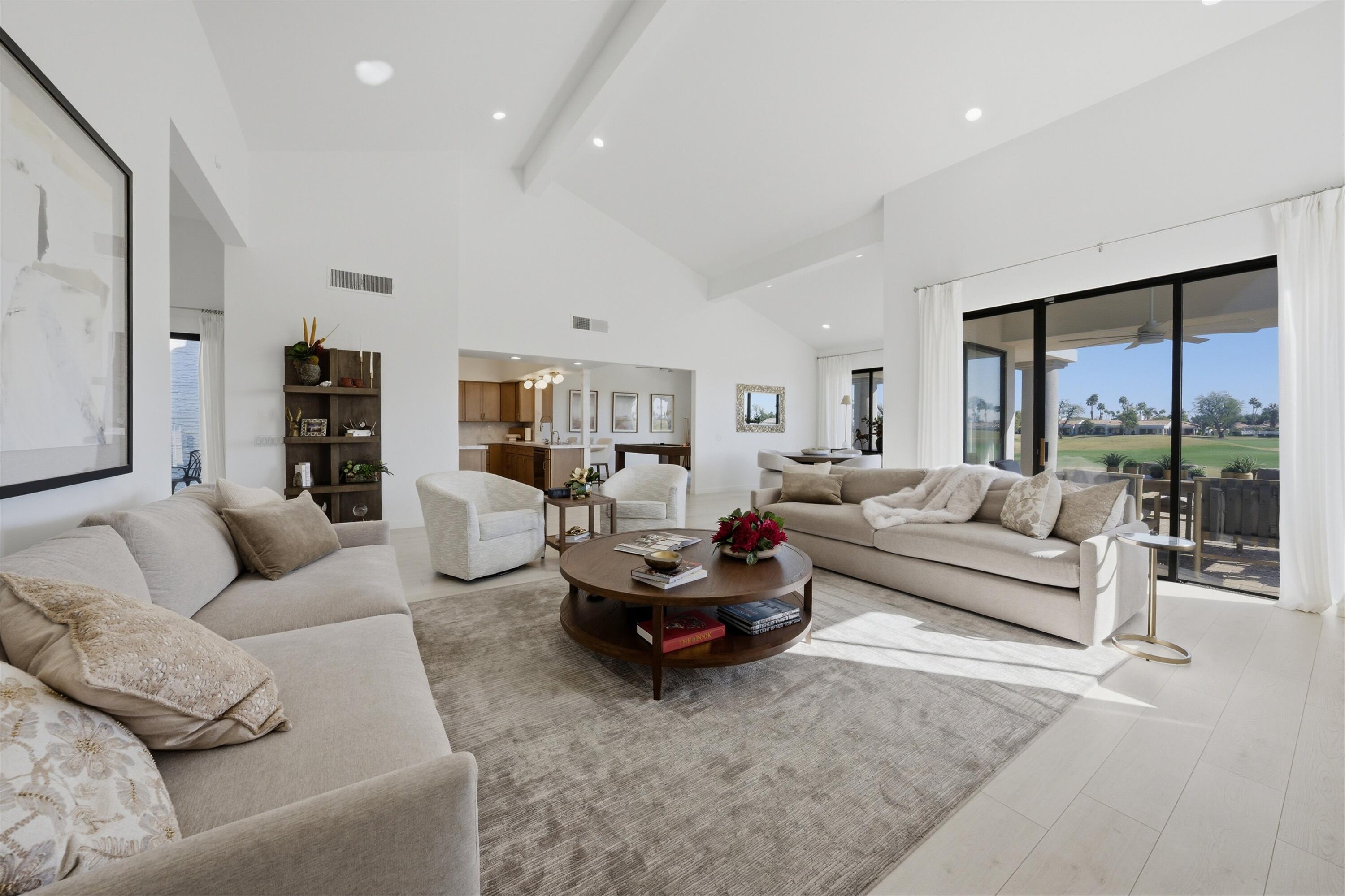 56300 Pebble Beach La Quinta, CA 92253 - Photo 22 of 45 a living room with furniture and a large window