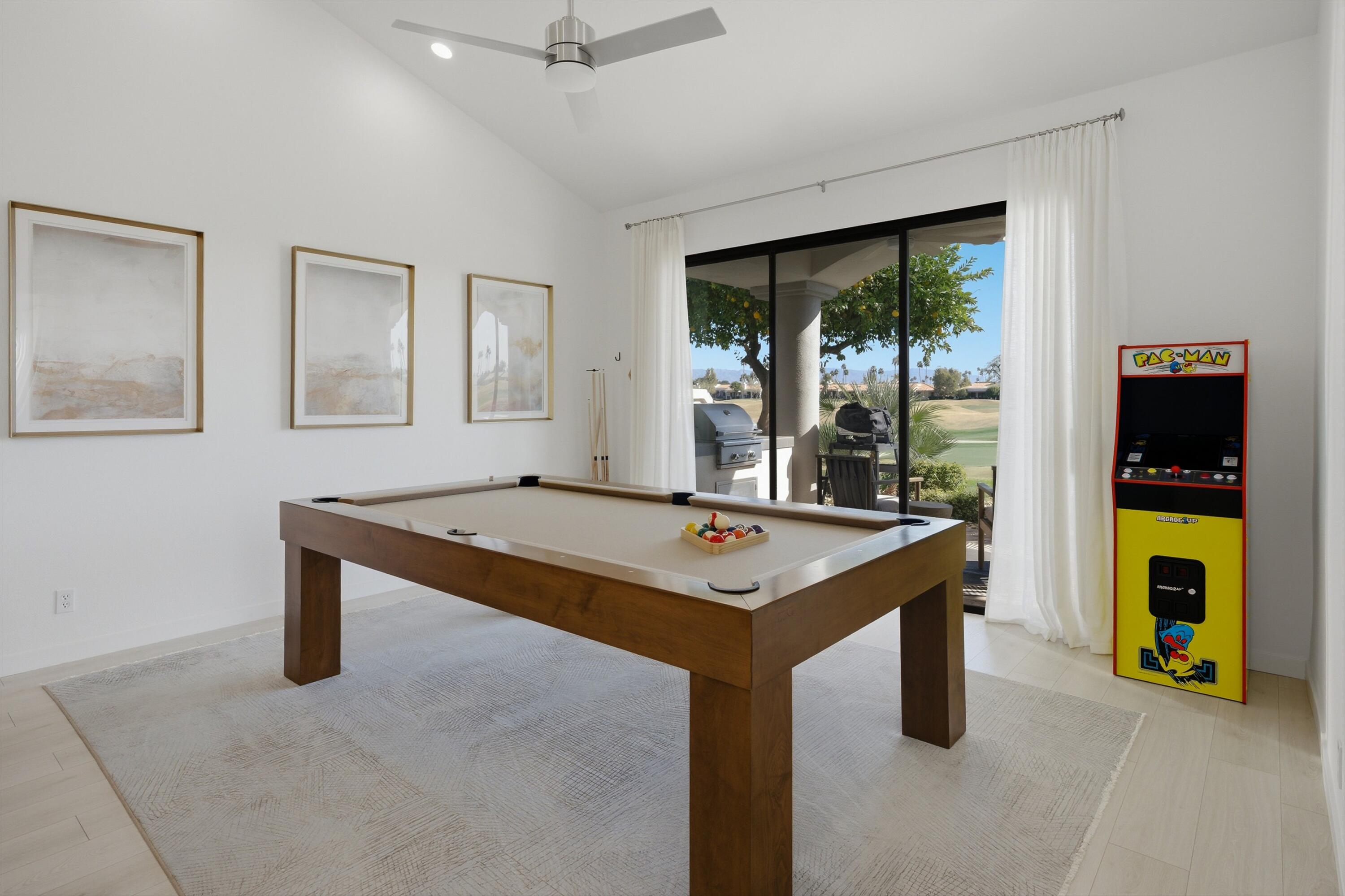 56300 Pebble Beach La Quinta, CA 92253 - Photo 31 of 45 a room with pool table and windows