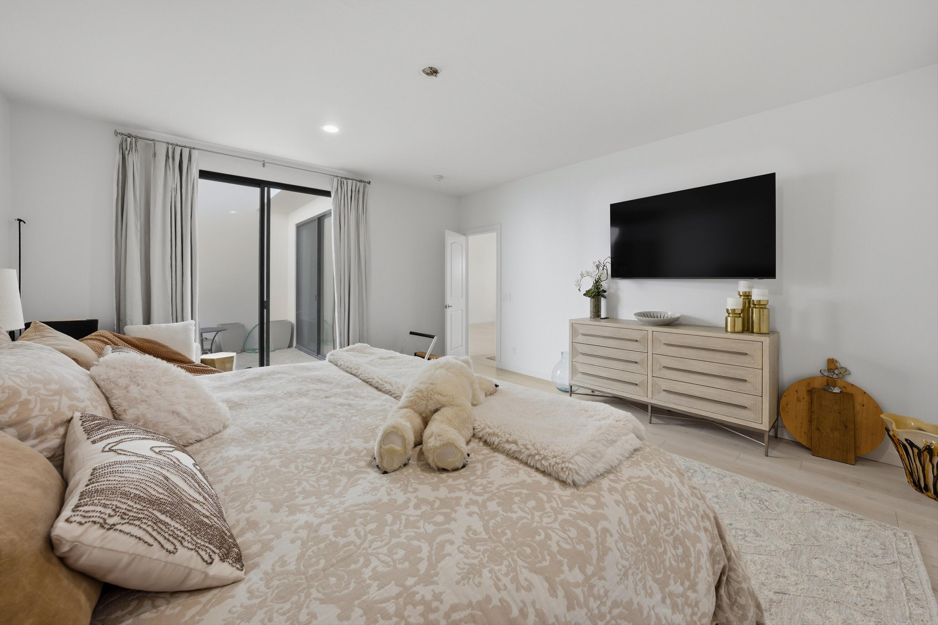 56300 Pebble Beach La Quinta, CA 92253 - Photo 37 of 45 a bedroom with a bed and a television