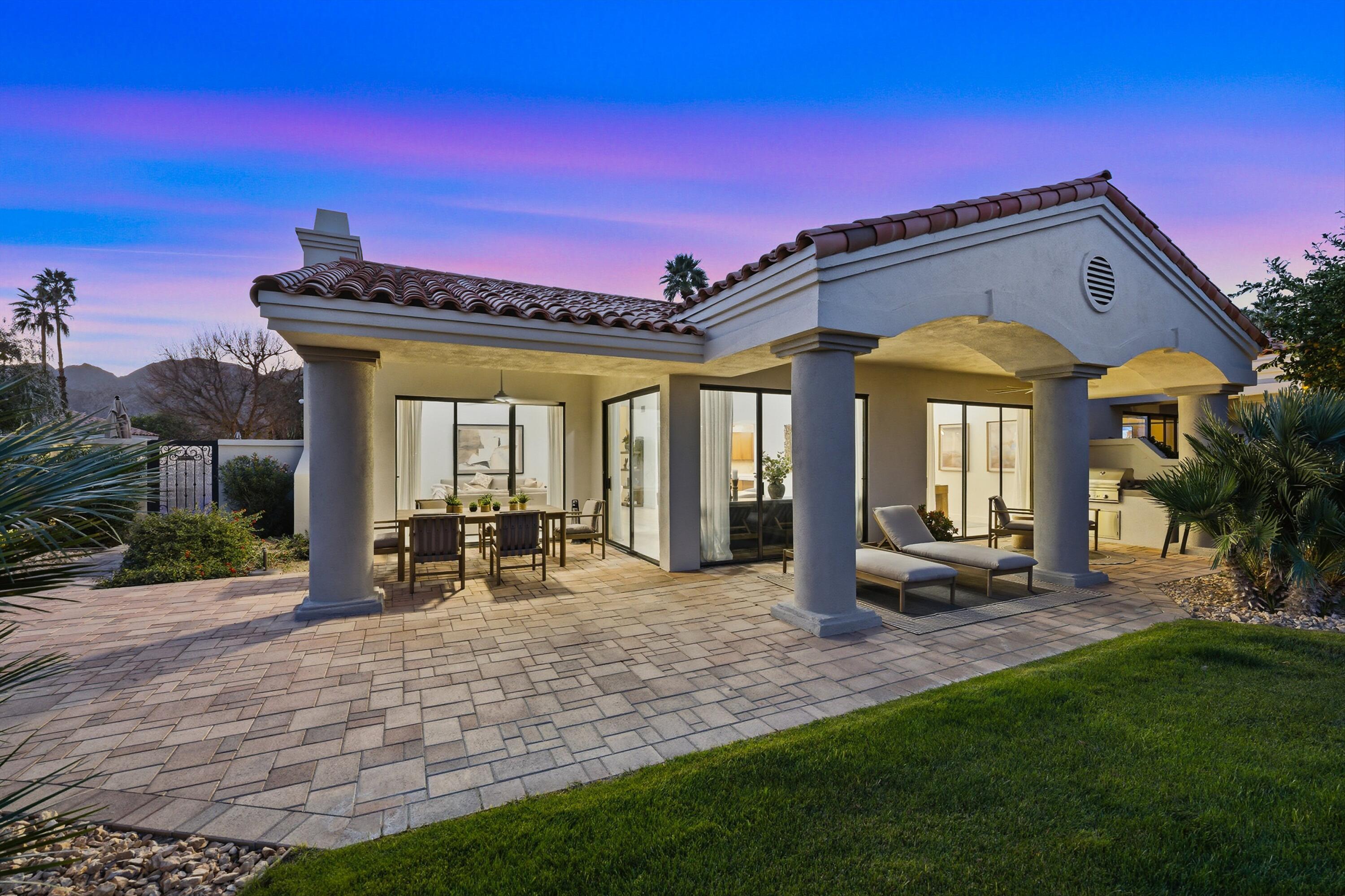 56300 Pebble Beach La Quinta, CA 92253 - Photo 4 of 45 a view of a house with sitting area and garden