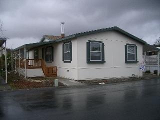 95 Cardinal Way Santa Rosa, CA 95409 - Photo 1 of 3 a front view of a house with a yard