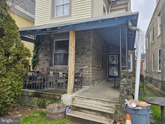 a view of a livingroom with furniture and window