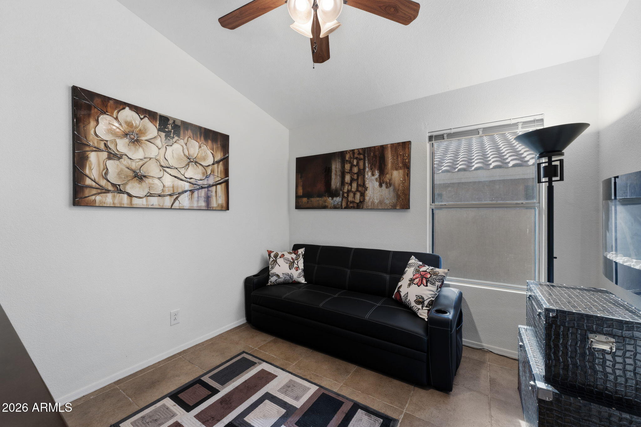 6526 East Raftriver Street Mesa, AZ 85215 - Photo 9 of 17 a living room with furniture and a ceiling fan