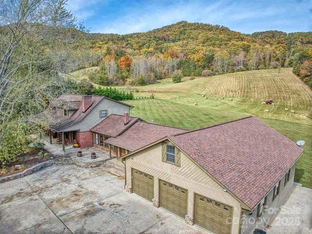 an aerial view of a house with a garden