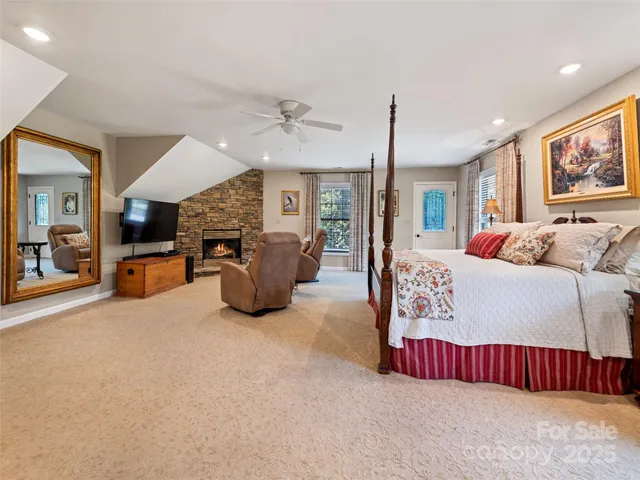 a bed room with furniture and a chandelier