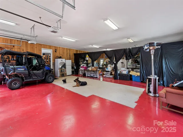 a view of a gym with lots of swings and slides