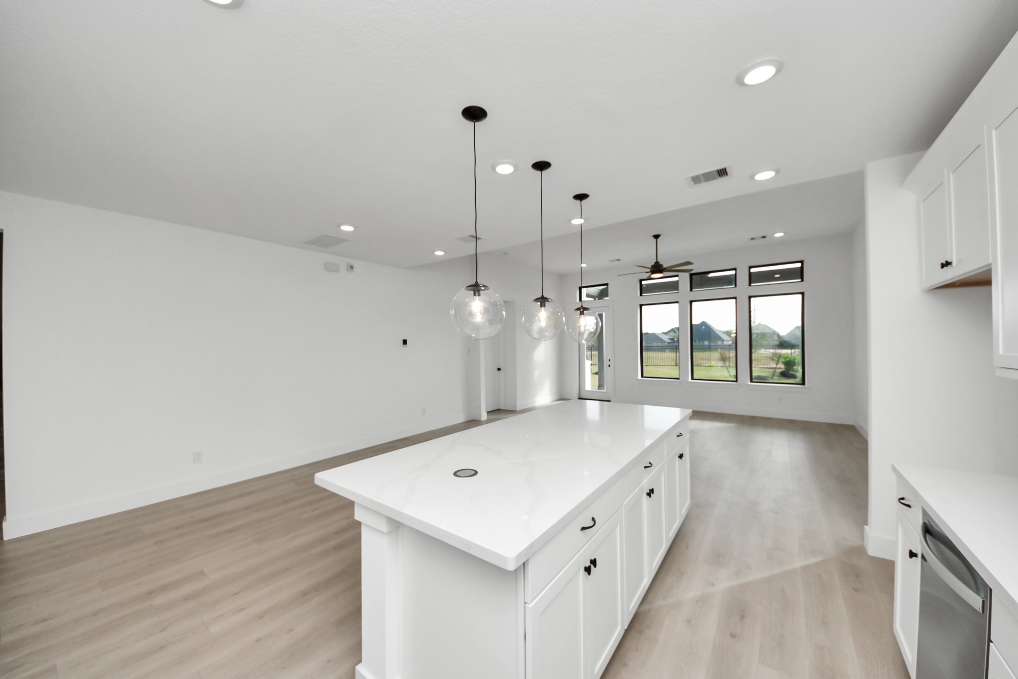 2231 Birch View Lane Katy, TX 77494 - Photo 15 of 40 wooden floor in an empty room with a window
