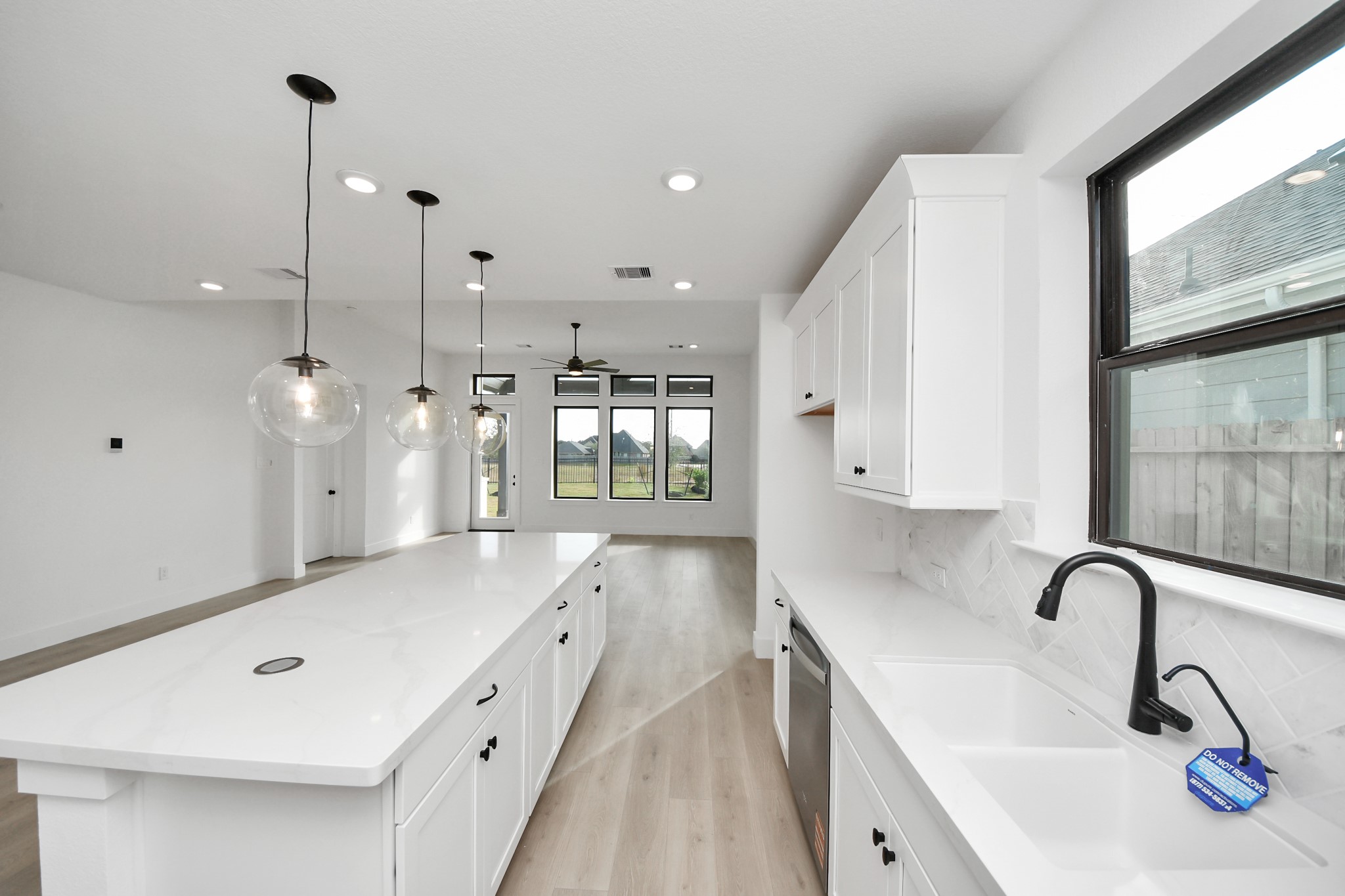 2231 Birch View Lane Katy, TX 77494 - Photo 16 of 40 a large kitchen with stainless steel appliances and large windows