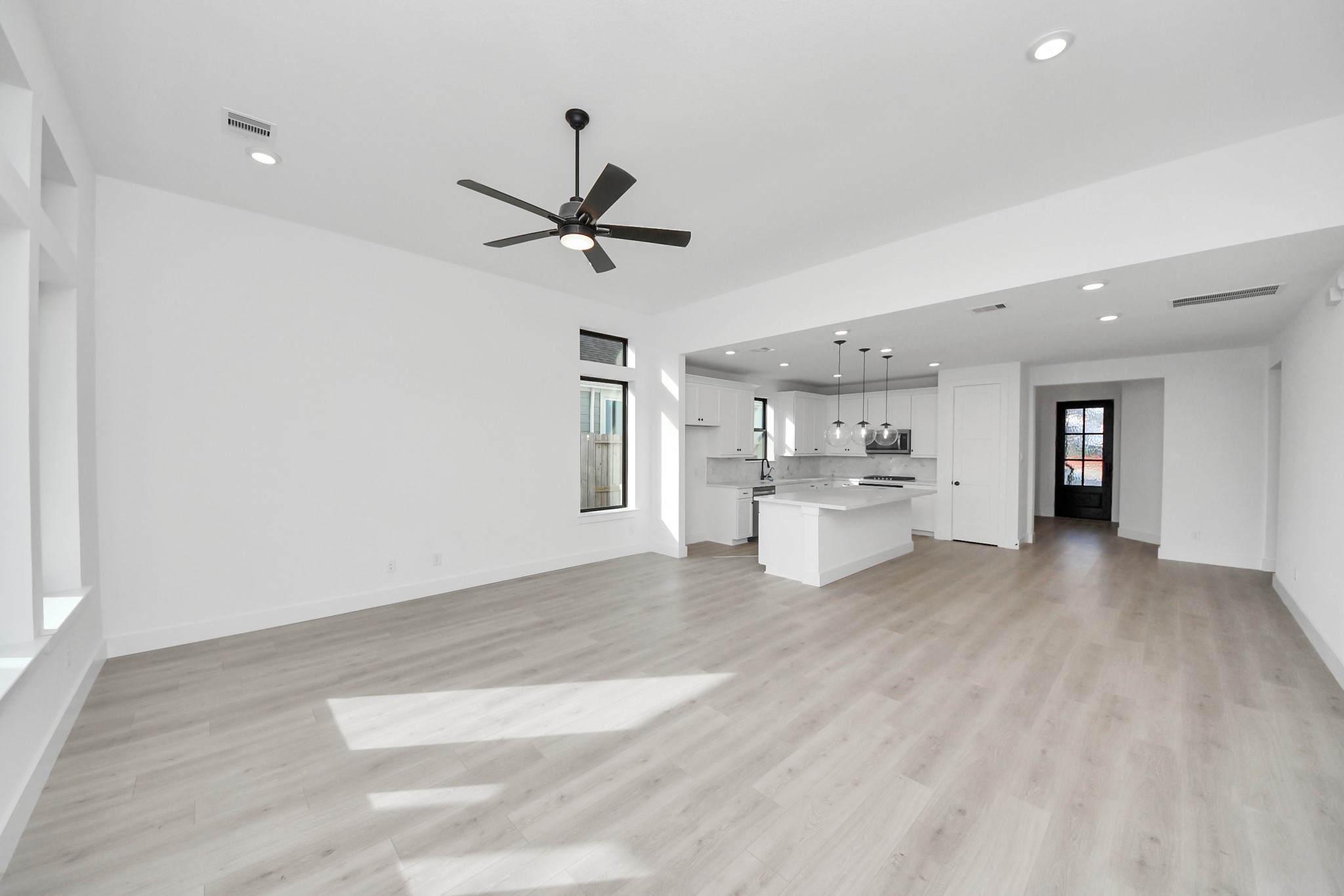 2231 Birch View Lane Katy, TX 77494 - Photo 19 of 40 a view of a livingroom with a kitchen