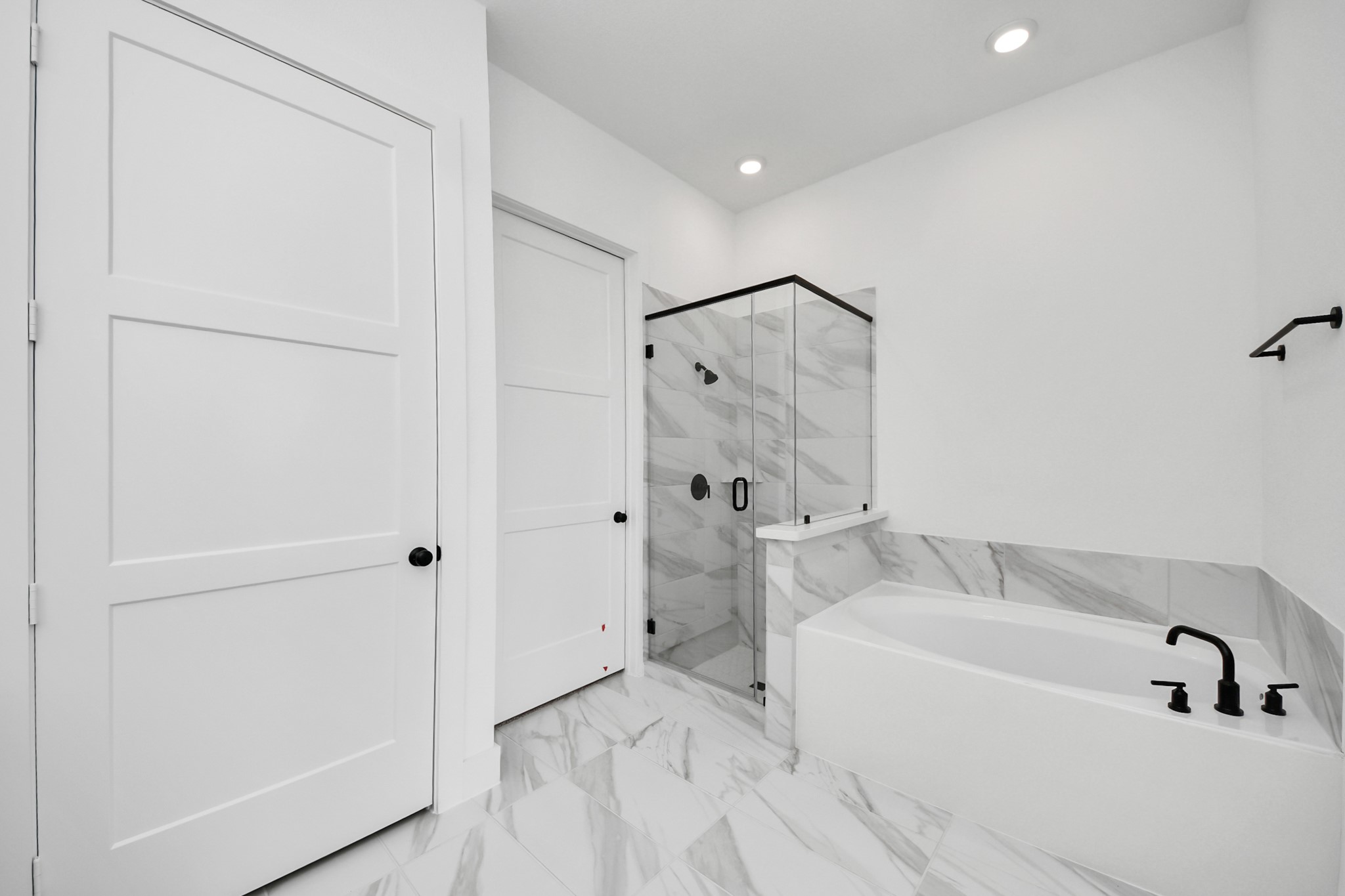 2231 Birch View Lane Katy, TX 77494 - Photo 23 of 40 a bathroom with a bathtub and a shower