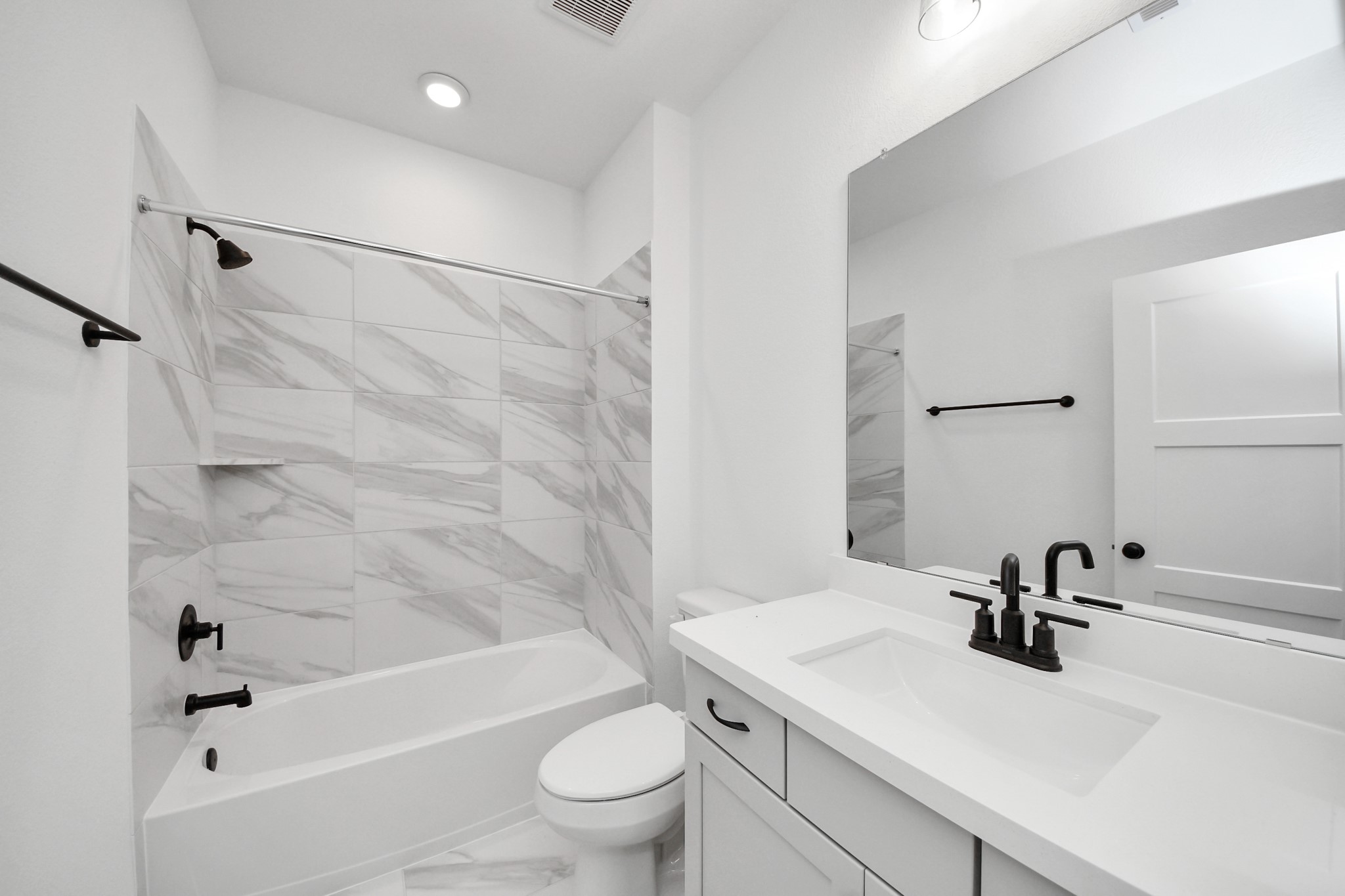 2231 Birch View Lane Katy, TX 77494 - Photo 29 of 40 a bathroom with a sink a toilet and a bathtub