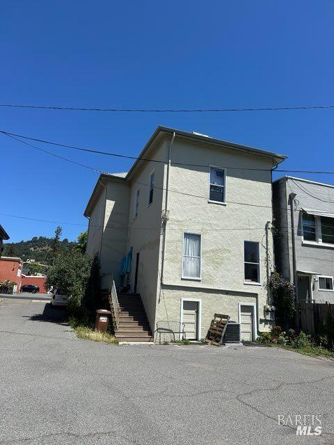 1547 4th Street, Unit A San Rafael, CA 94901 - Photo 5 of 64 a front view of a house with a yard