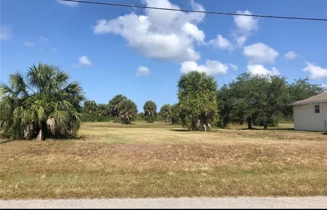 a view of big yard with an outdoor space