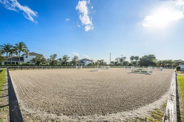 a front view of a house with swimming pool