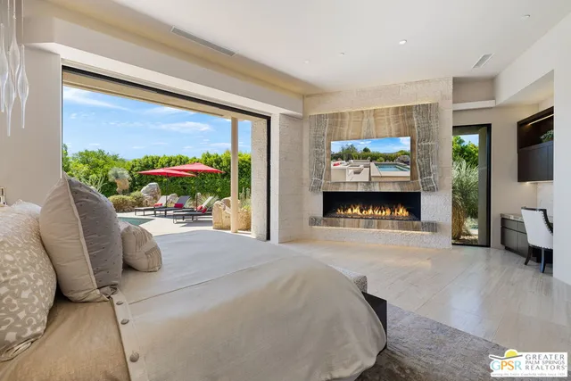 a bath tub sitting in a bathroom next to a large window