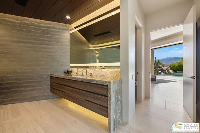 a view of a swimming pool with a yard