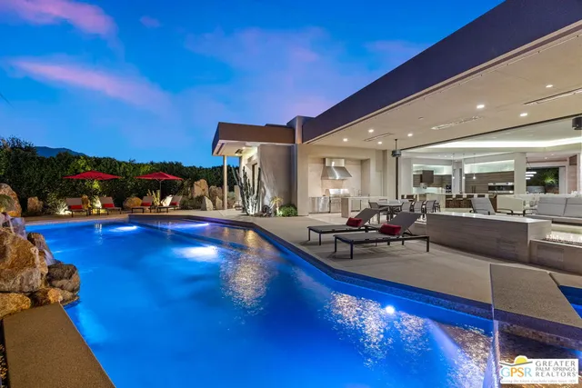 a bathroom with a double vanity sink and mirror