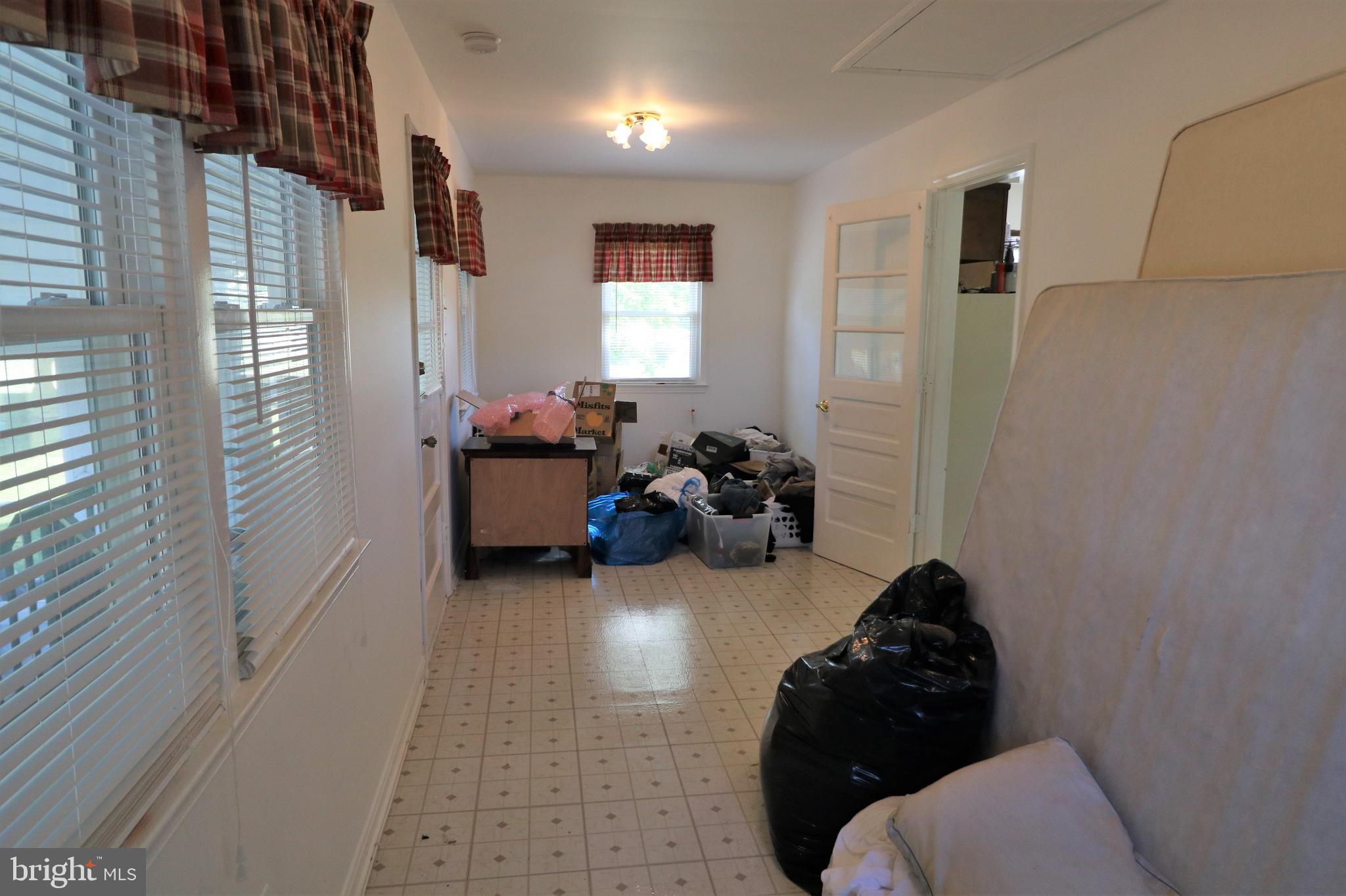 2312 Smoky Road Huntingtown, MD 20639 - Photo 12 of 55 Room between Kitchen & Sunroom, possible B/R!