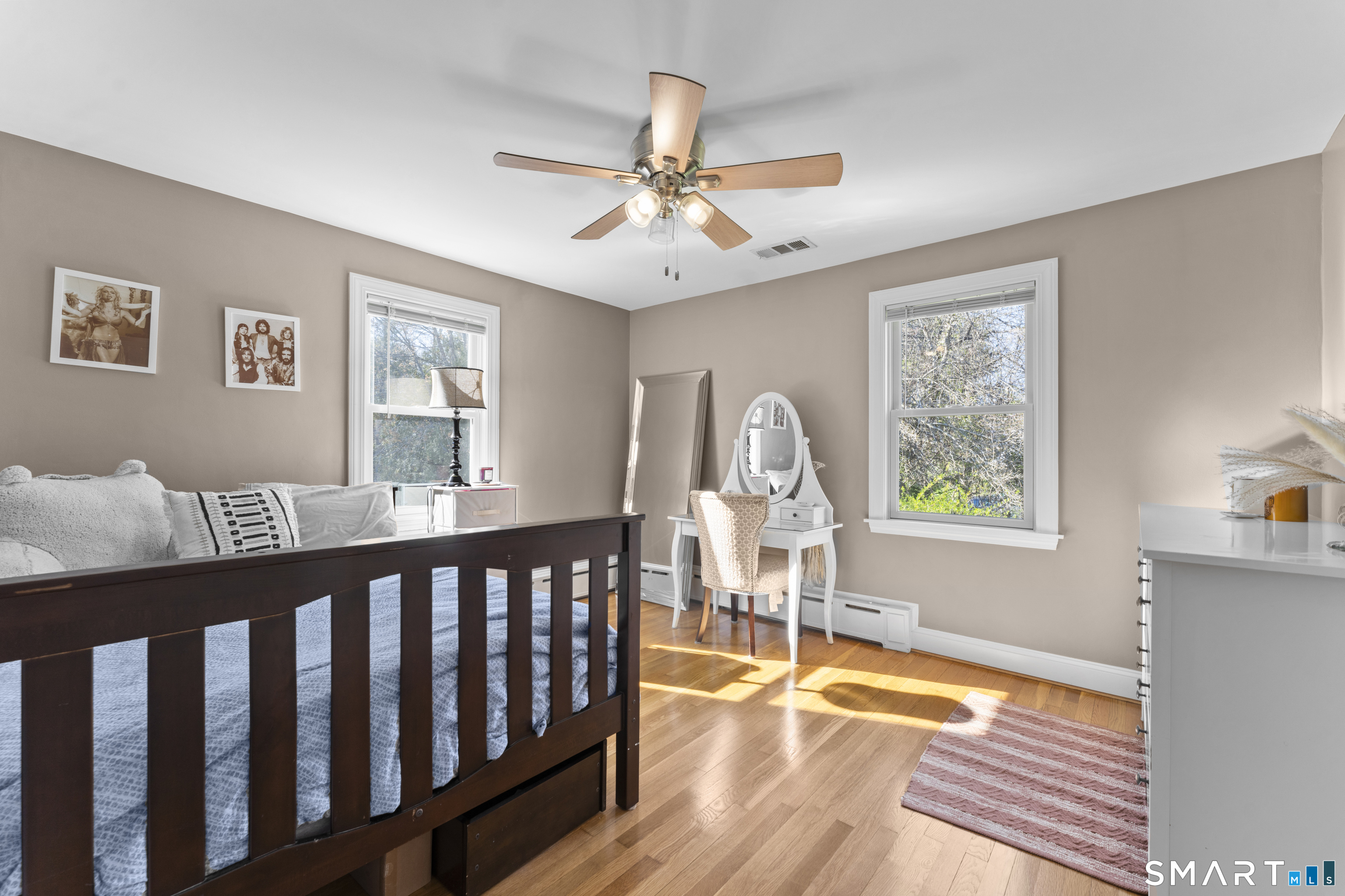 1253 North Street Suffield, CT 06078 - Photo 15 of 33 a view of a livingroom with furniture window and wooden floor
