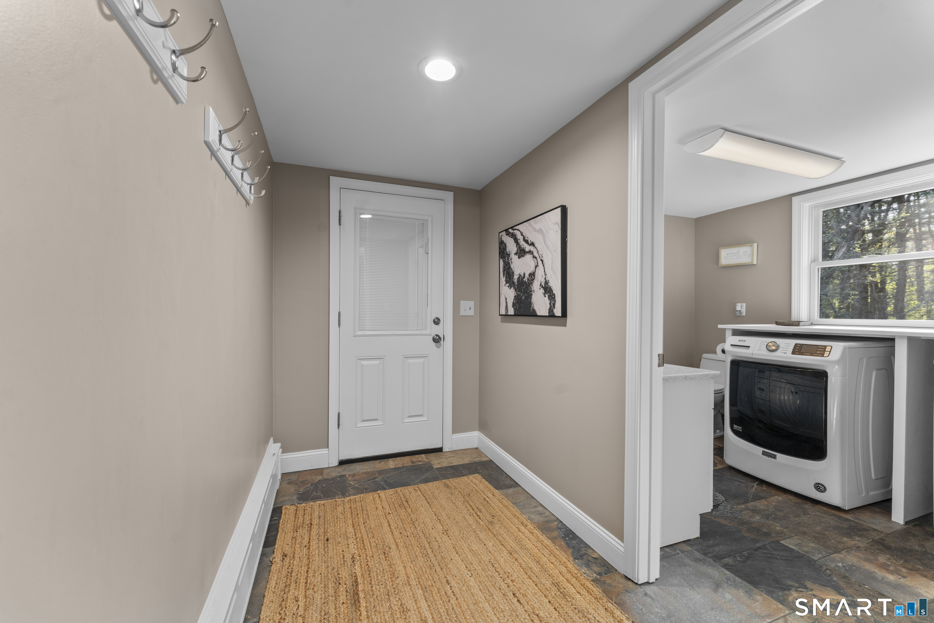 1253 North Street Suffield, CT 06078 - Photo 17 of 33 a view of a kitchen from the hallway