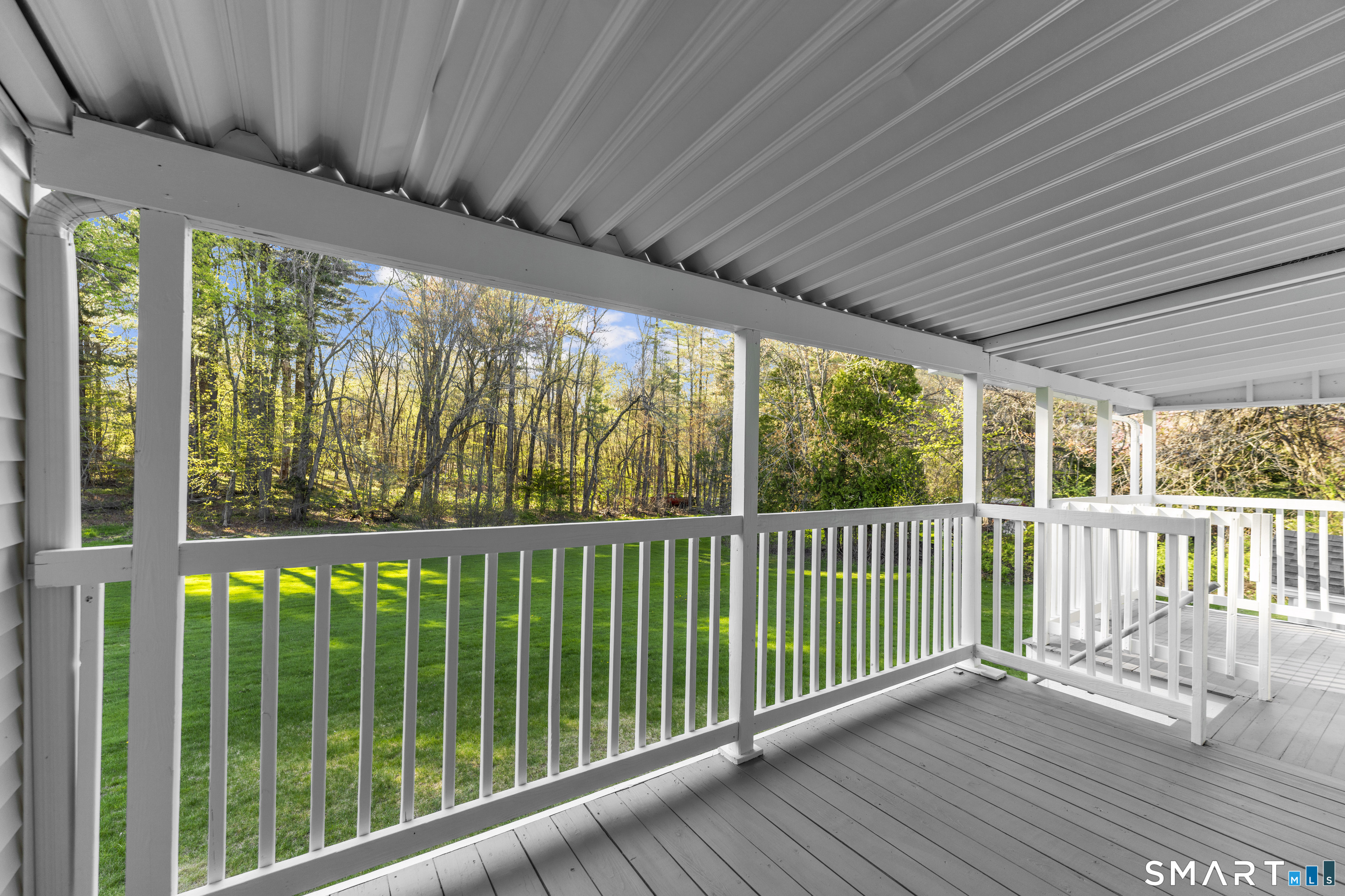 1253 North Street Suffield, CT 06078 - Photo 23 of 33 a view of a porch with wooden floor