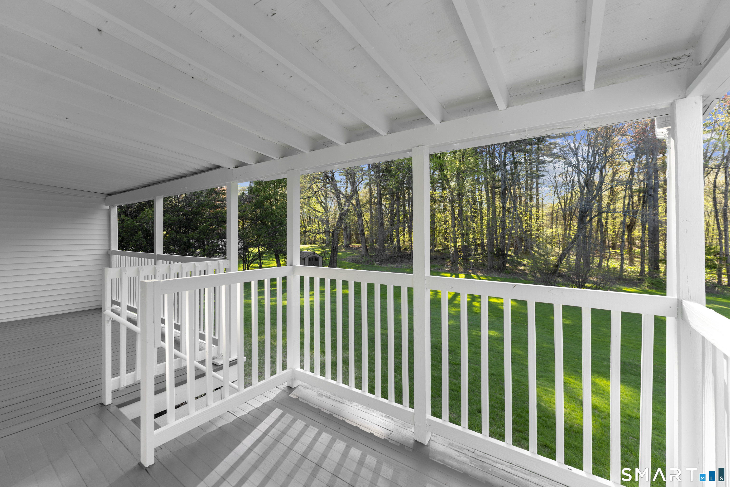 1253 North Street Suffield, CT 06078 - Photo 24 of 33 a view of a chair in the balcony