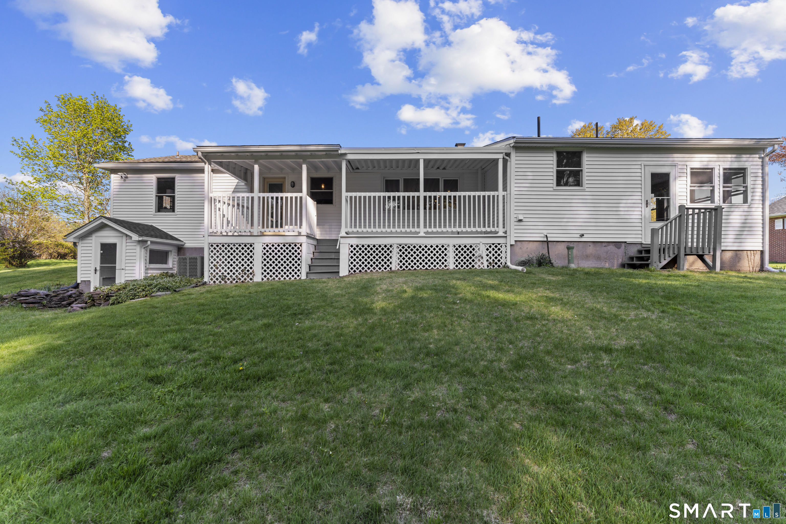 1253 North Street Suffield, CT 06078 - Photo 28 of 33 a view of a house with a yard