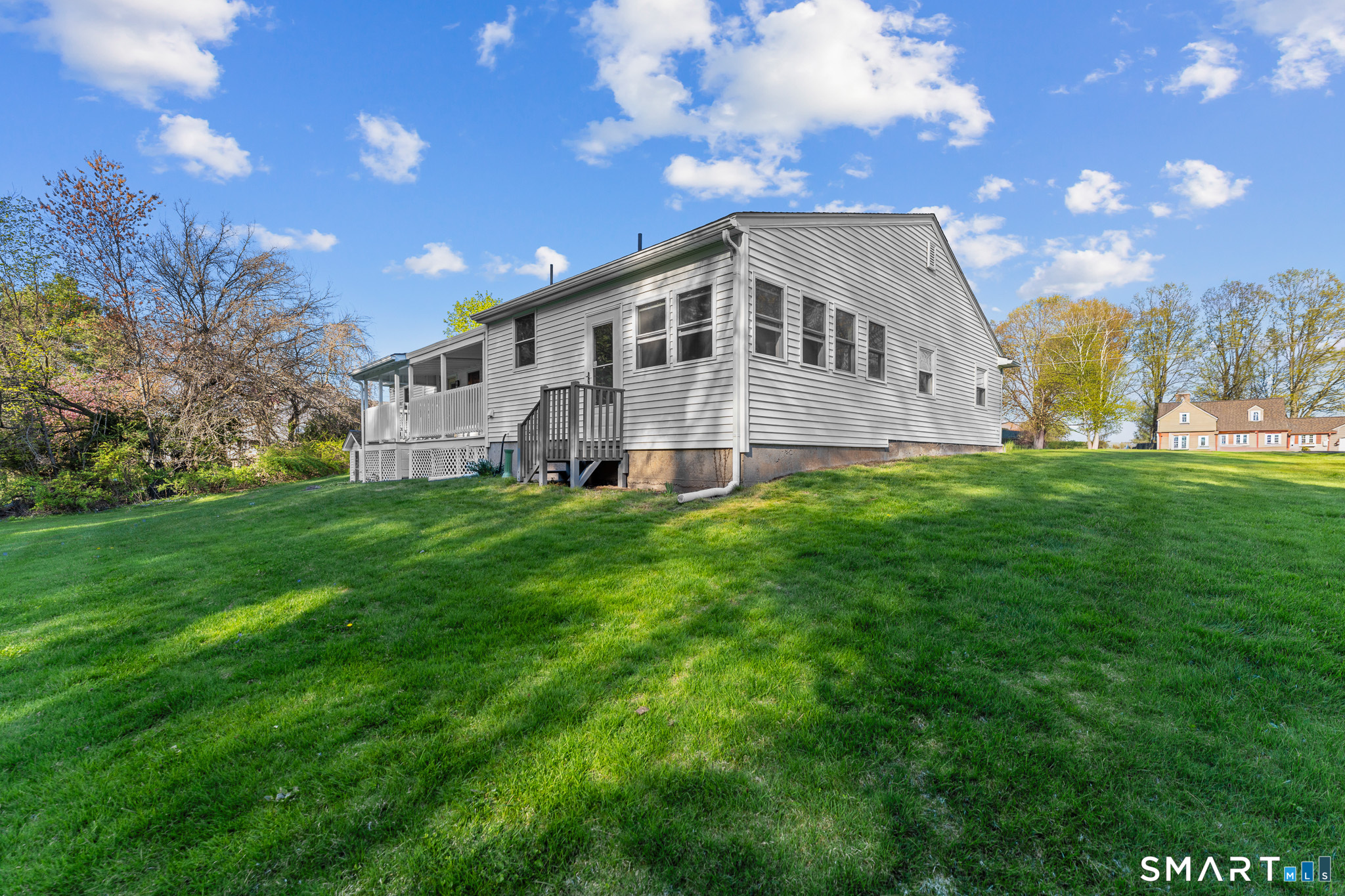 1253 North Street Suffield, CT 06078 - Photo 29 of 33 a front view of a house with a yard