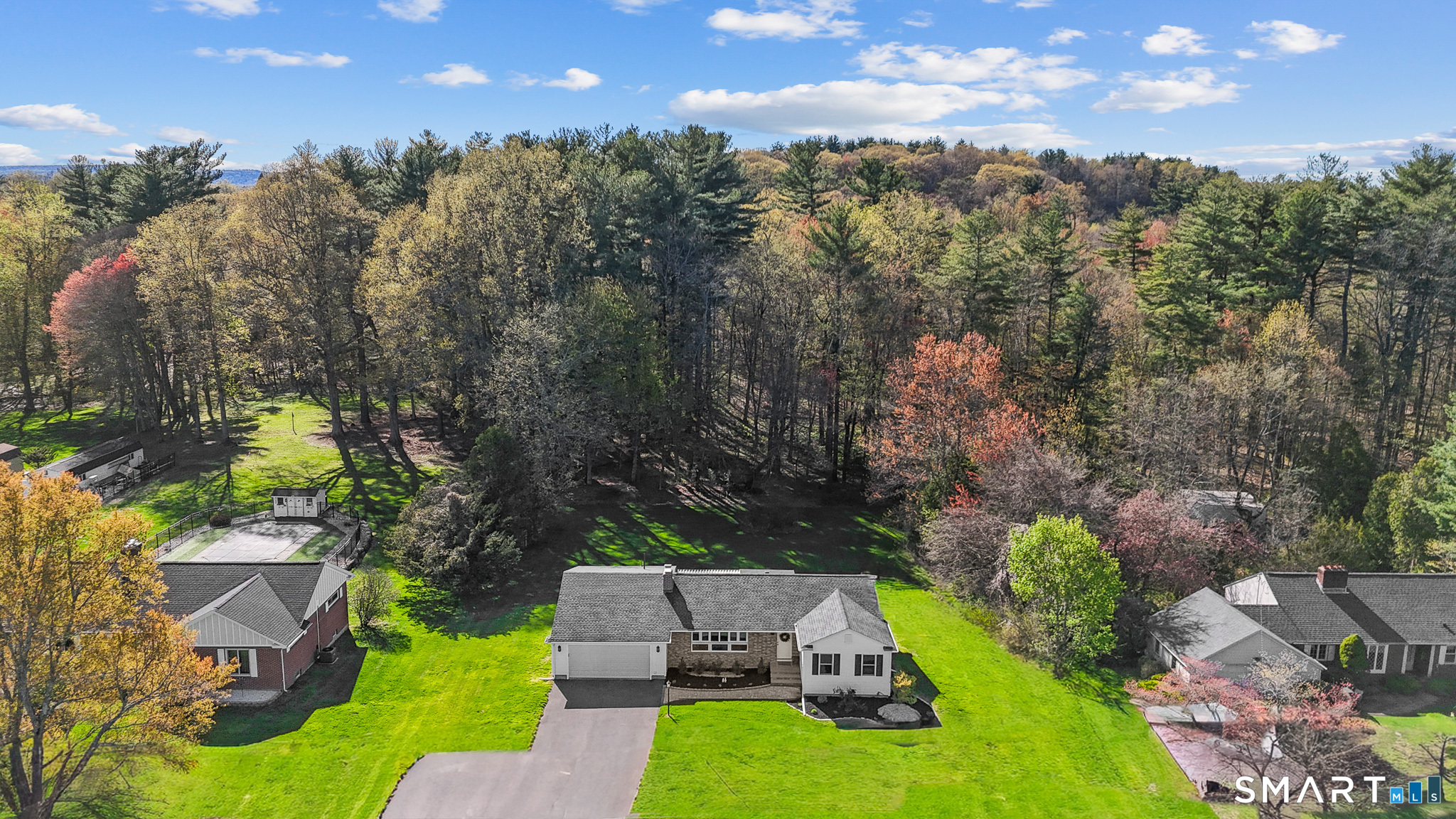 1253 North Street Suffield, CT 06078 - Photo 32 of 33 an aerial view of a house with a yard and garden