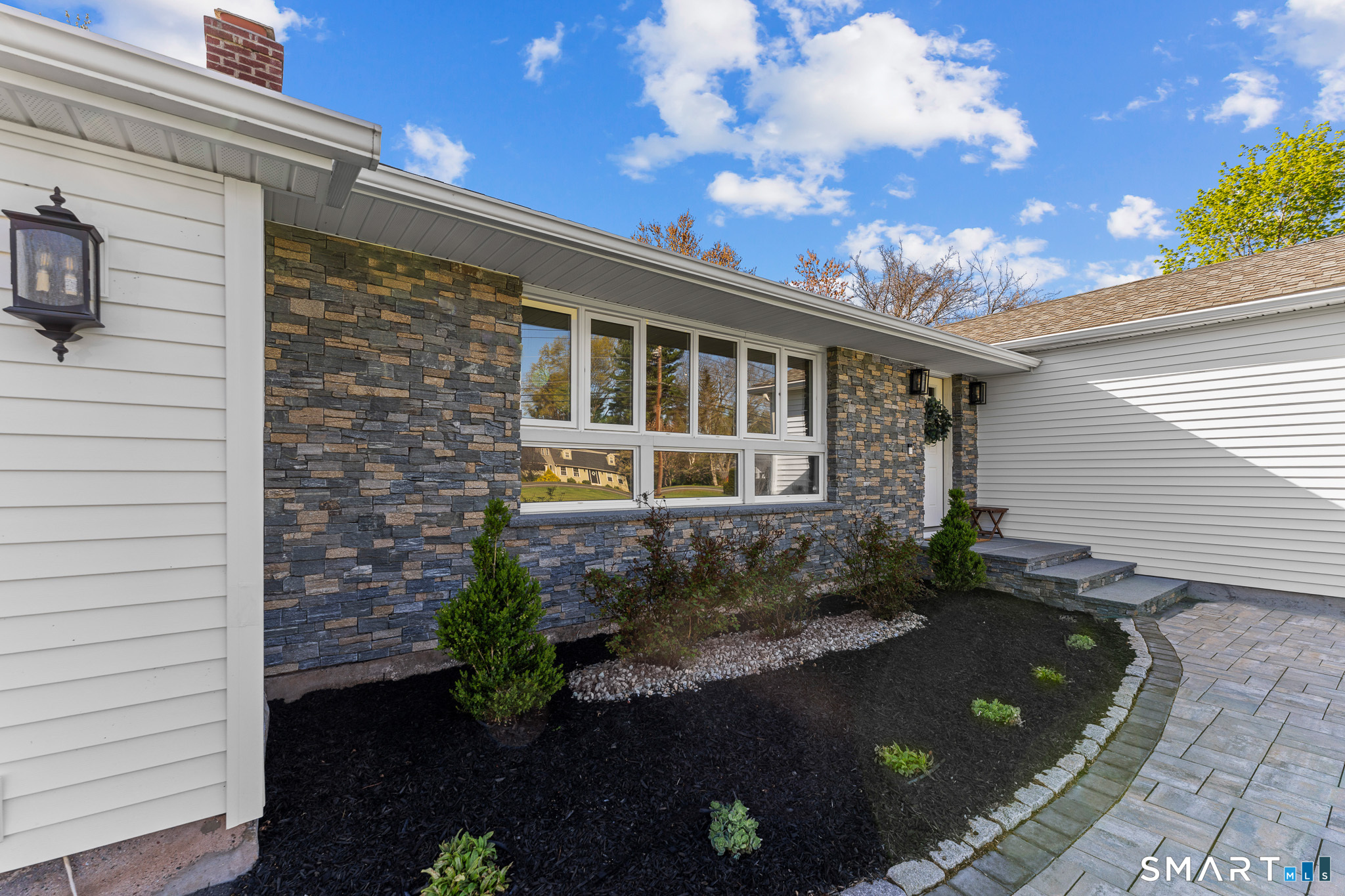 1253 North Street Suffield, CT 06078 - Photo 4 of 33 a front view of a house with a yard