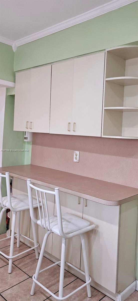 3121 Southwest 23rd Street Miami, FL 33145 - Photo 11 of 31 a view of a room with table chairs and cabinets