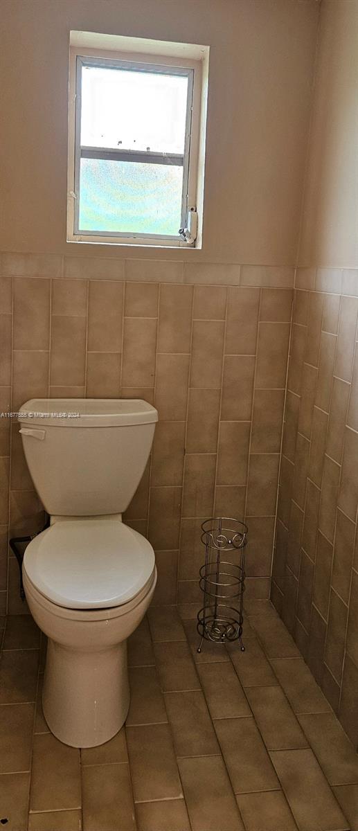 3121 Southwest 23rd Street Miami, FL 33145 - Photo 19 of 31 a bathroom with a toilet and a shower