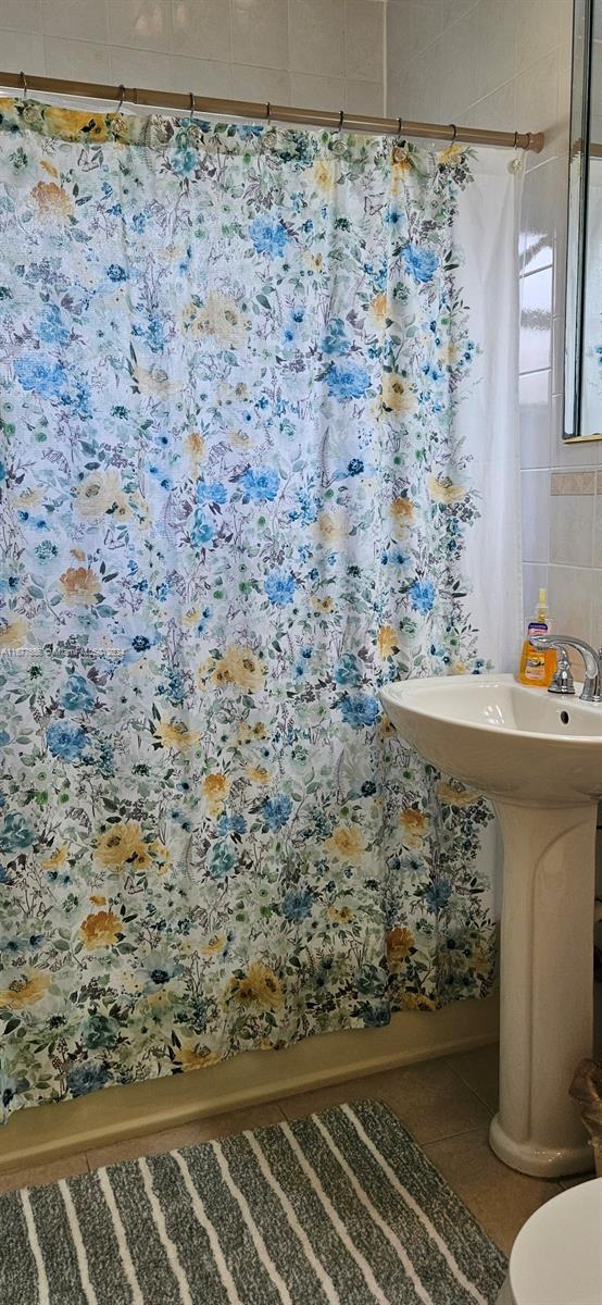 3121 Southwest 23rd Street Miami, FL 33145 - Photo 21 of 31 a bathroom with a sink and a mirror