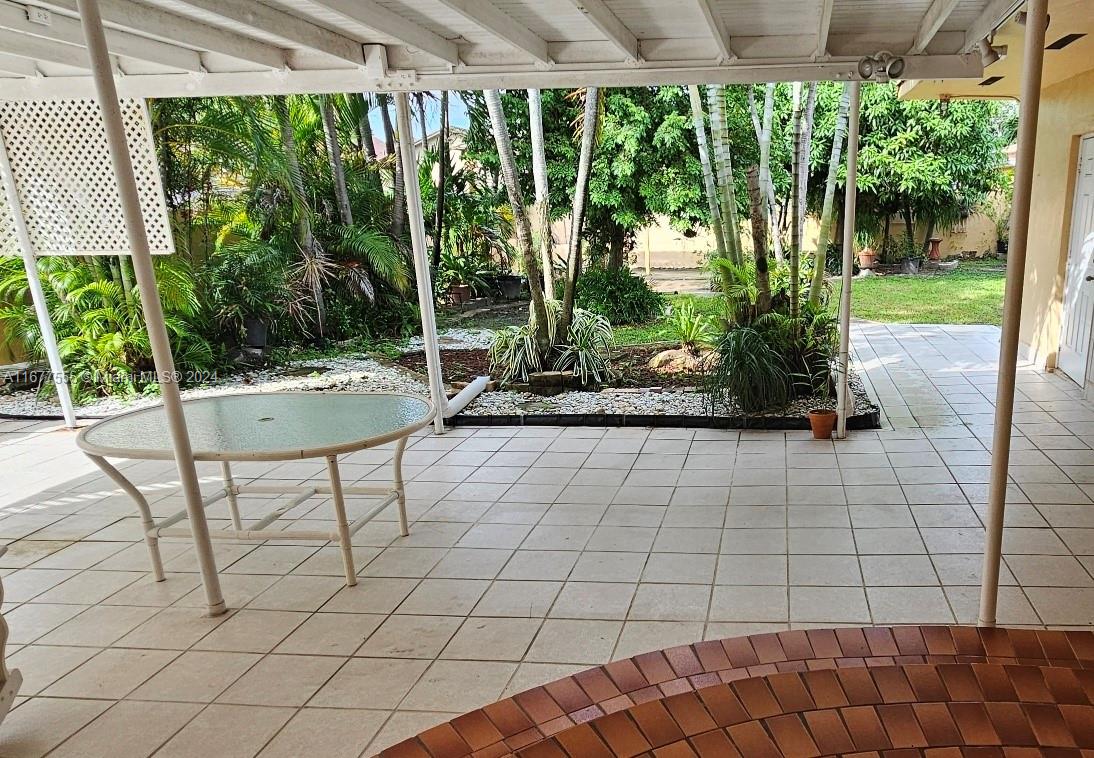 3121 Southwest 23rd Street Miami, FL 33145 - Photo 23 of 31 a view of garden with patio