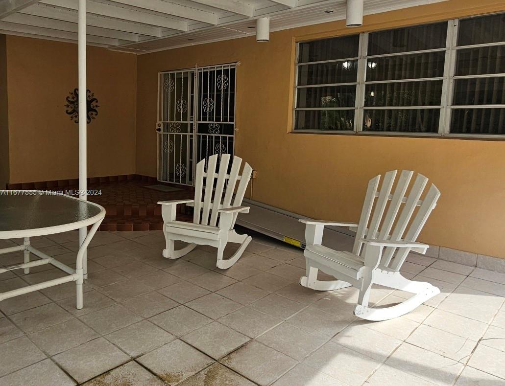 3121 Southwest 23rd Street Miami, FL 33145 - Photo 24 of 31 a chairs and a table in a room