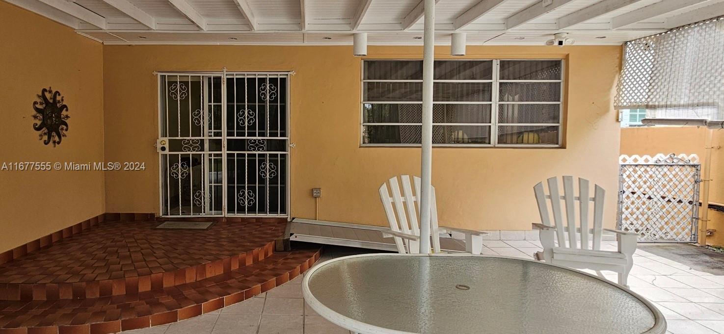 3121 Southwest 23rd Street Miami, FL 33145 - Photo 26 of 31 a view of a dining room with windows