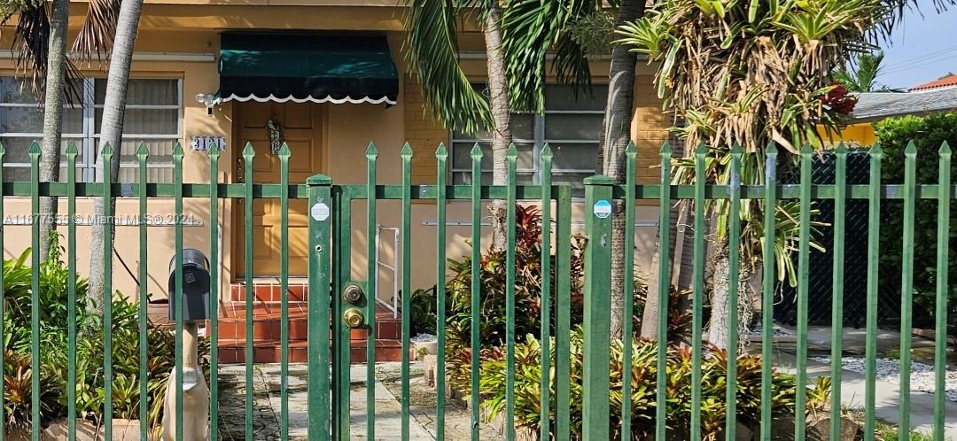 3121 Southwest 23rd Street Miami, FL 33145 - Photo 29 of 31 a view of a house with a garden