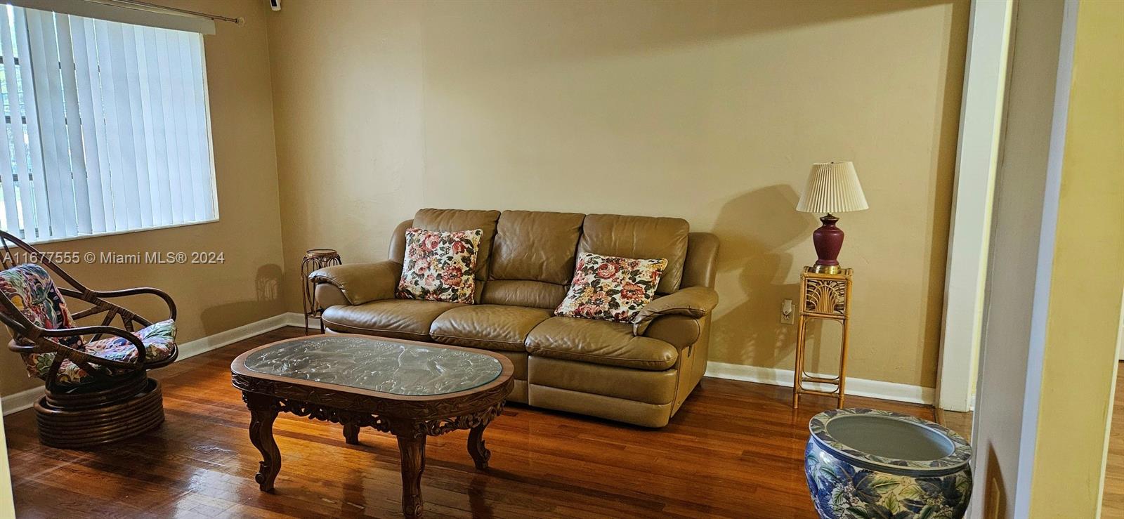 3121 Southwest 23rd Street Miami, FL 33145 - Photo 30 of 31 a living room with a couch and a table
