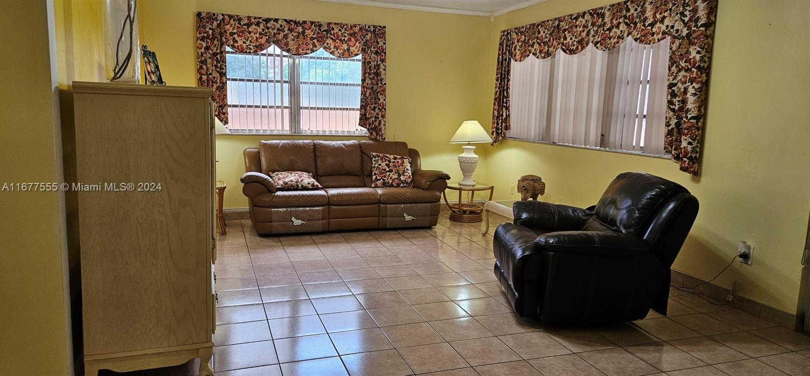3121 Southwest 23rd Street Miami, FL 33145 - Photo 3 of 31 a living room with furniture and a window