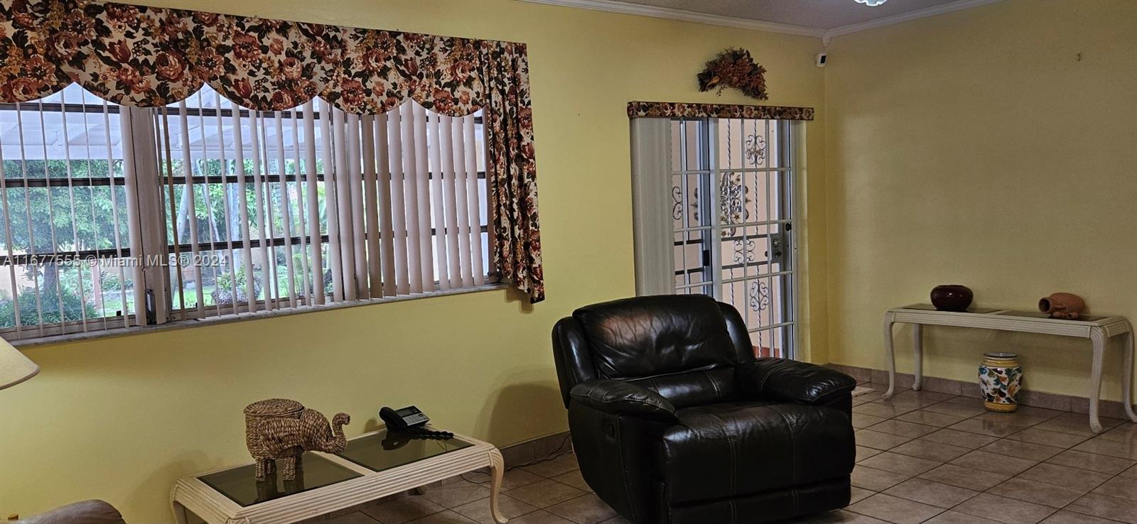 3121 Southwest 23rd Street Miami, FL 33145 - Photo 4 of 31 a living room with furniture and a window