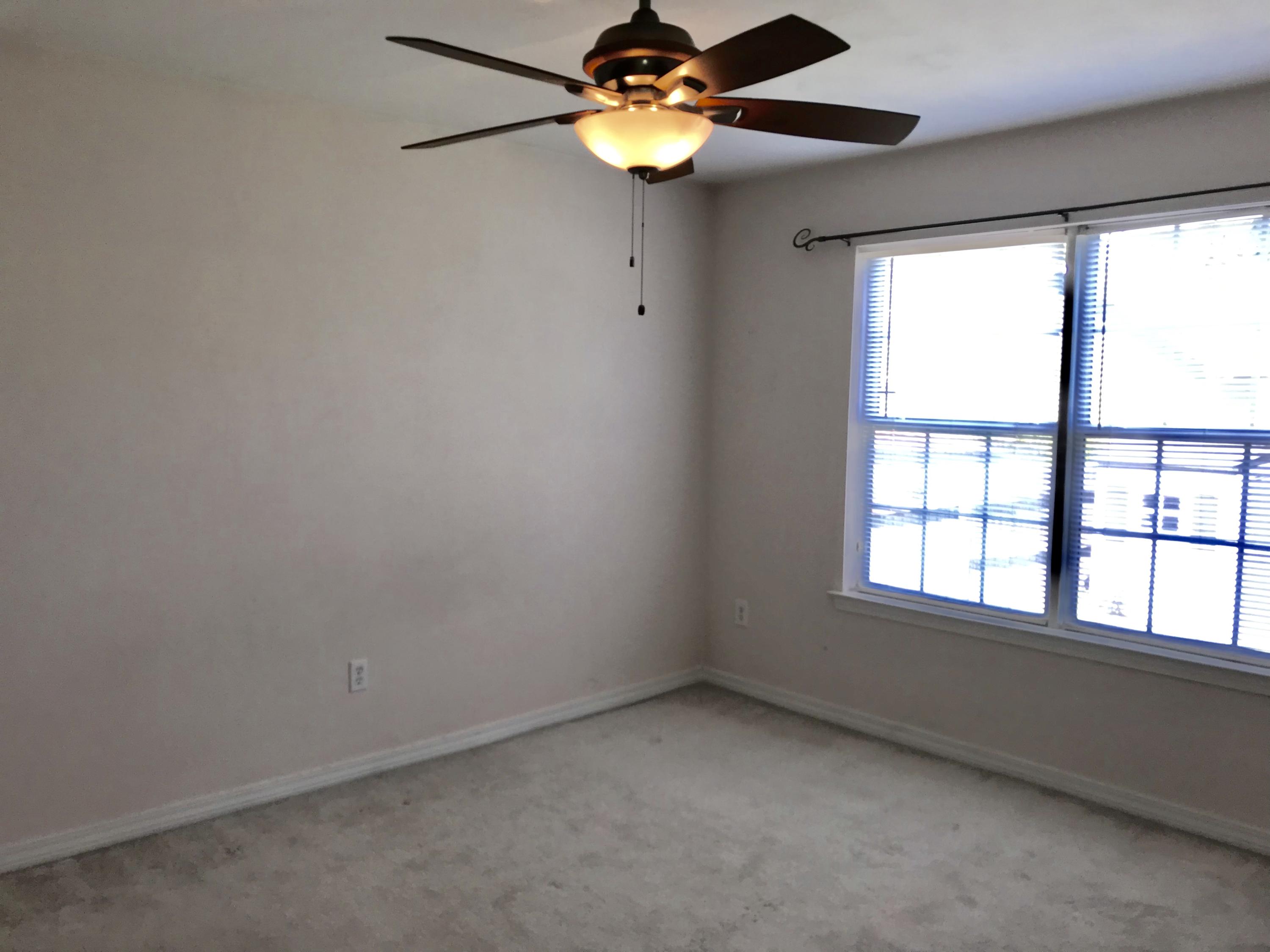 38 4th Street Santa Rosa Beach, FL 32459 - Photo 16 of 22 a view of an empty room with a window