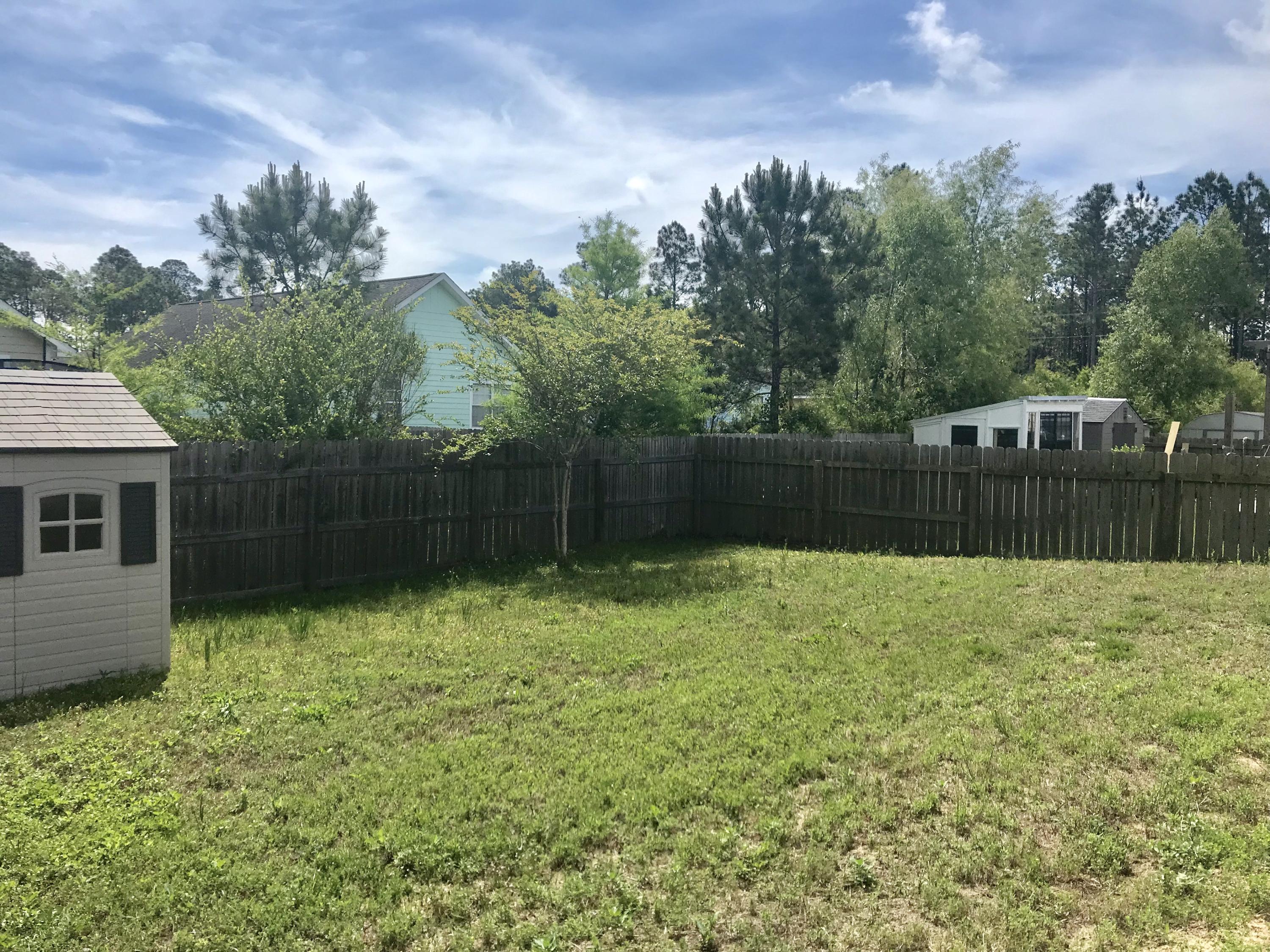 38 4th Street Santa Rosa Beach, FL 32459 - Photo 19 of 22 a view of backyard with green space