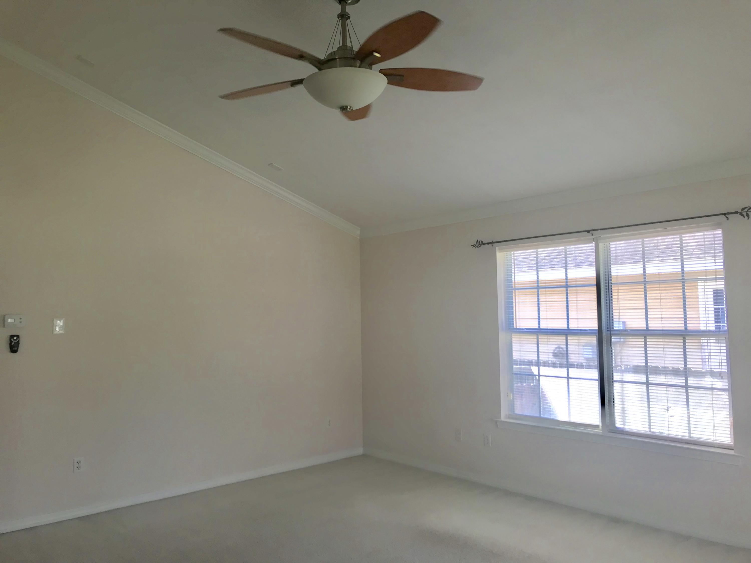 38 4th Street Santa Rosa Beach, FL 32459 - Photo 2 of 22 an empty room with a window
