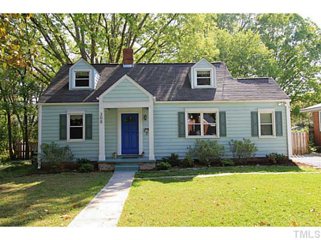308 Colleton Road Raleigh, NC 27610 - Photo 23 of 25 a front view of a house with garden