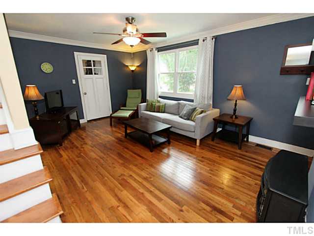 308 Colleton Road Raleigh, NC 27610 - Photo 4 of 25 a living room with furniture and a large window