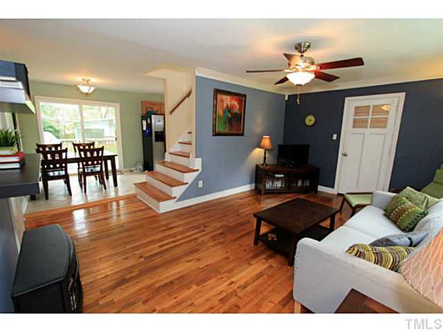 308 Colleton Road Raleigh, NC 27610 - Photo 5 of 25 a living room with furniture and wooden floor