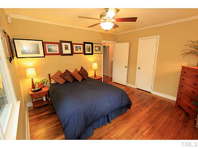 308 Colleton Road Raleigh, NC 27610 - Photo 6 of 25 a bed room with a bed