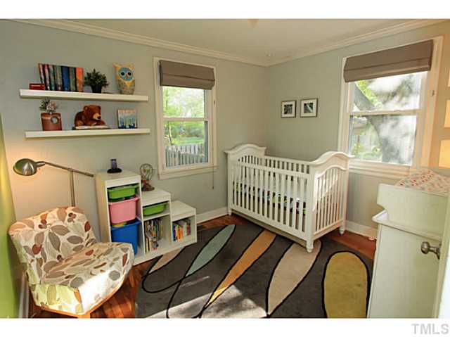 308 Colleton Road Raleigh, NC 27610 - Photo 7 of 25 a bedroom with furniture and a window